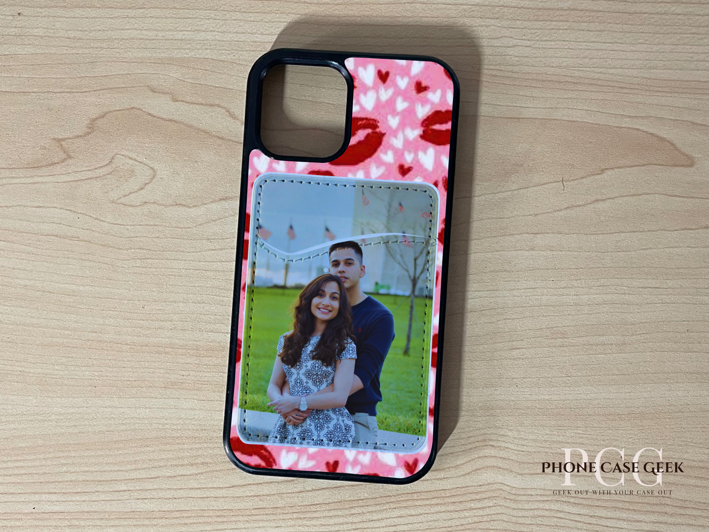 Custom phone case with heart and kiss design with phone wallet/card holder with couple photo on a wooden surface