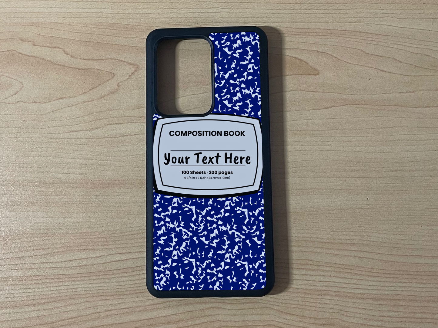 Custom phone case for the Samsung Note 20 and Note 20 Ultra with a blue and white composition notebook design with text "Your text here" on a wooden surface.