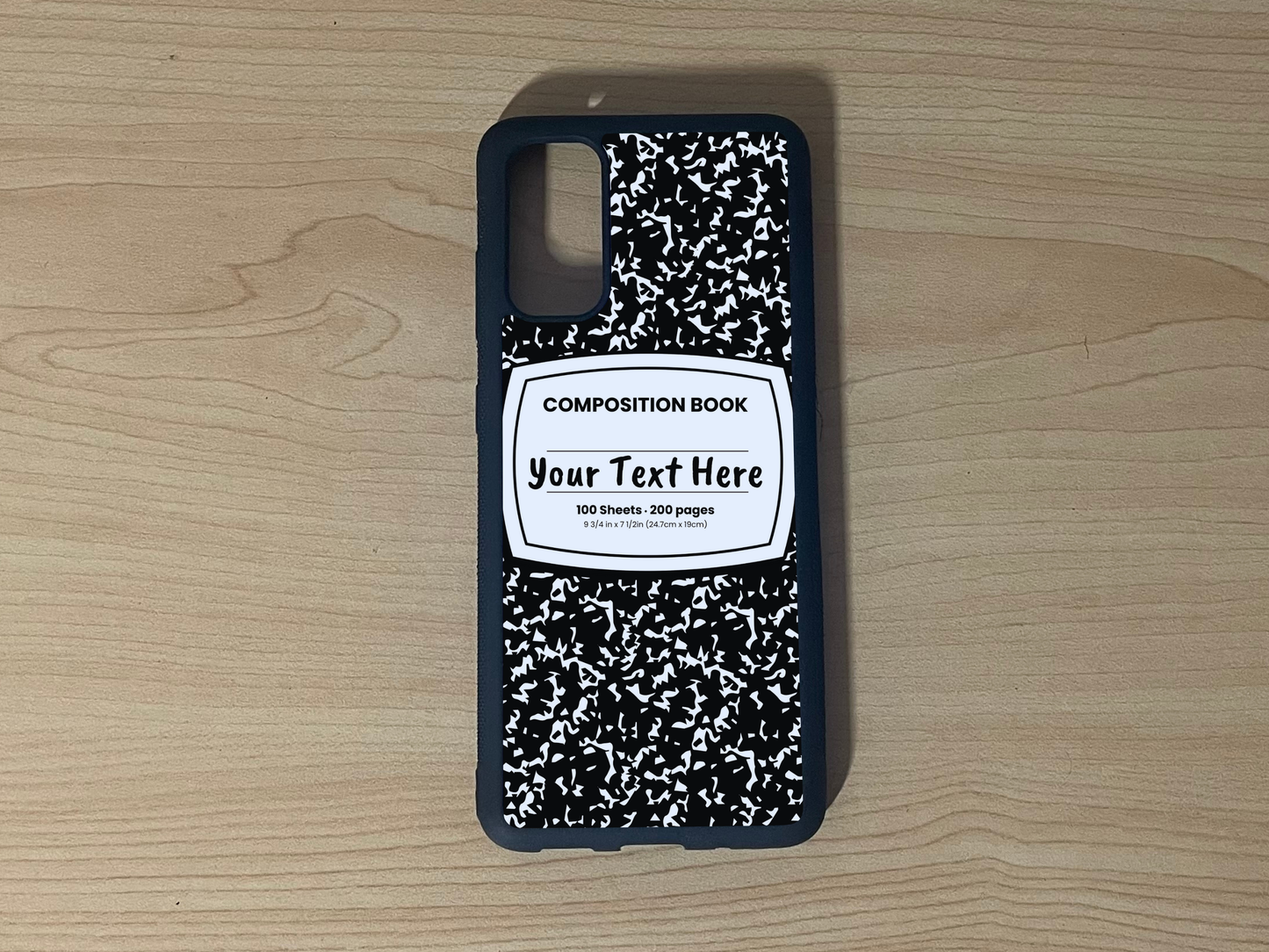 Custom phone case for the Samsung S20, S20 Ultra and S20fe with a black and white composition notebook design with text "Your text here" on a wooden surface.