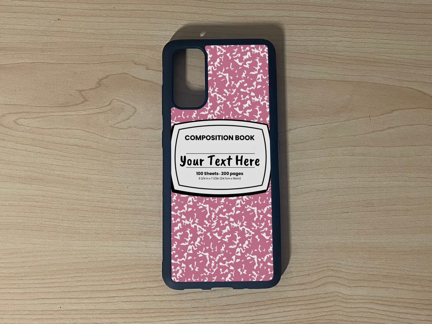 Custom phone case for the Samsung S20, S20 Ultra and S20 FE with a pink and white composition notebook design with text "Your text here" on a wooden surface.
