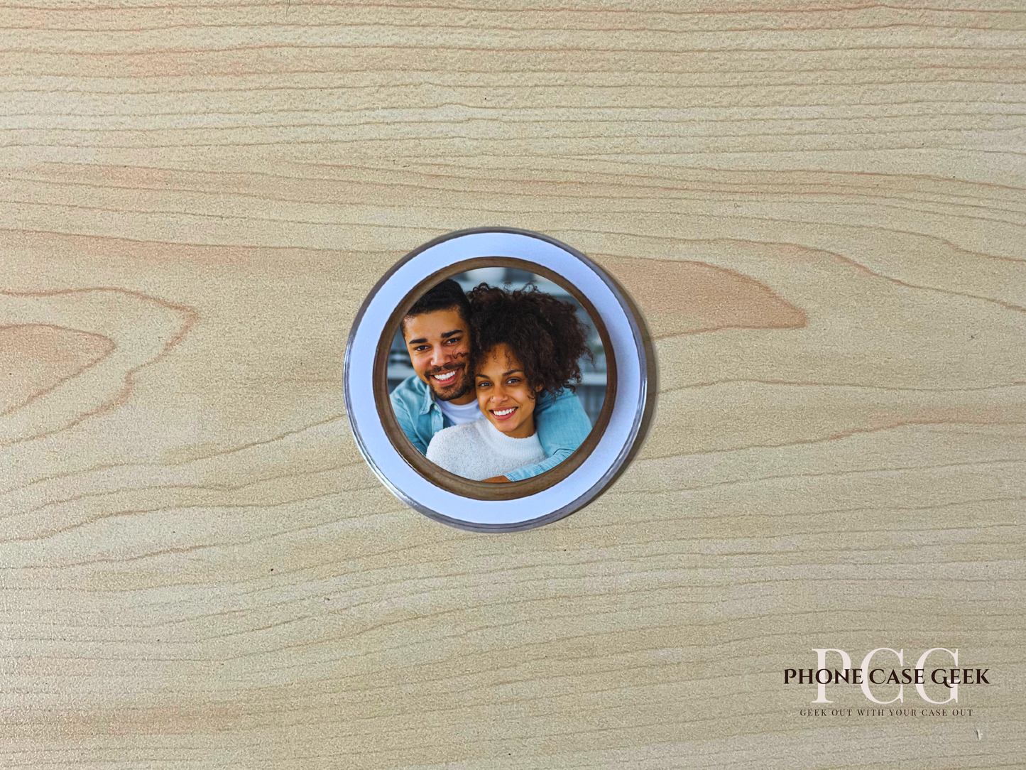 Custom clear base Magsafe phone grip with photo of a couple on a wooden surface.