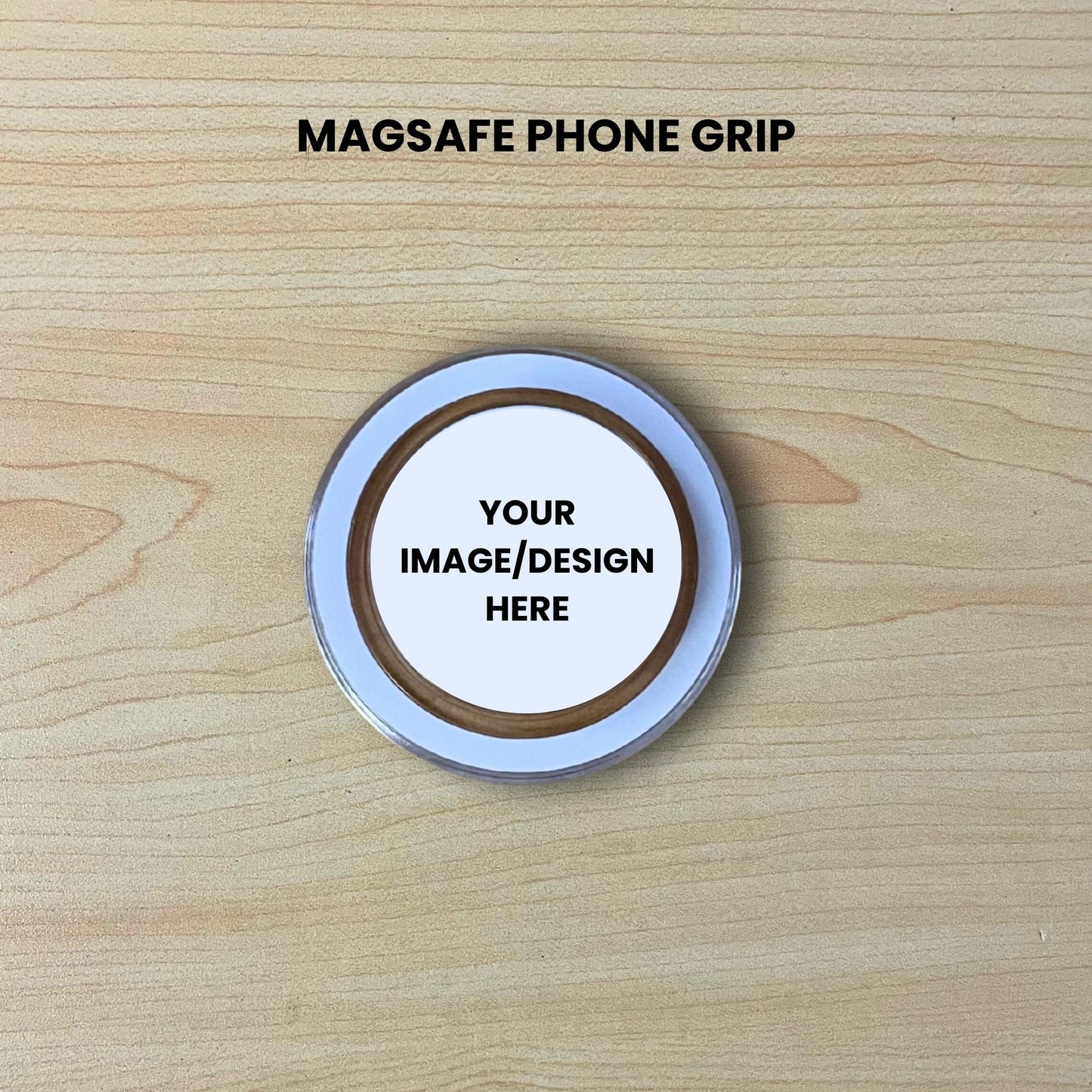 Custom clear base Magsafe phone grip mockup on a wooden surface with customizable area.