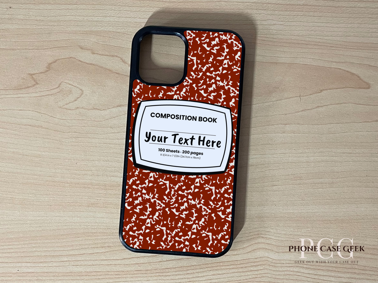 Custom iPhone case with red and white composition book design with "Your text here" written on a wooden surface