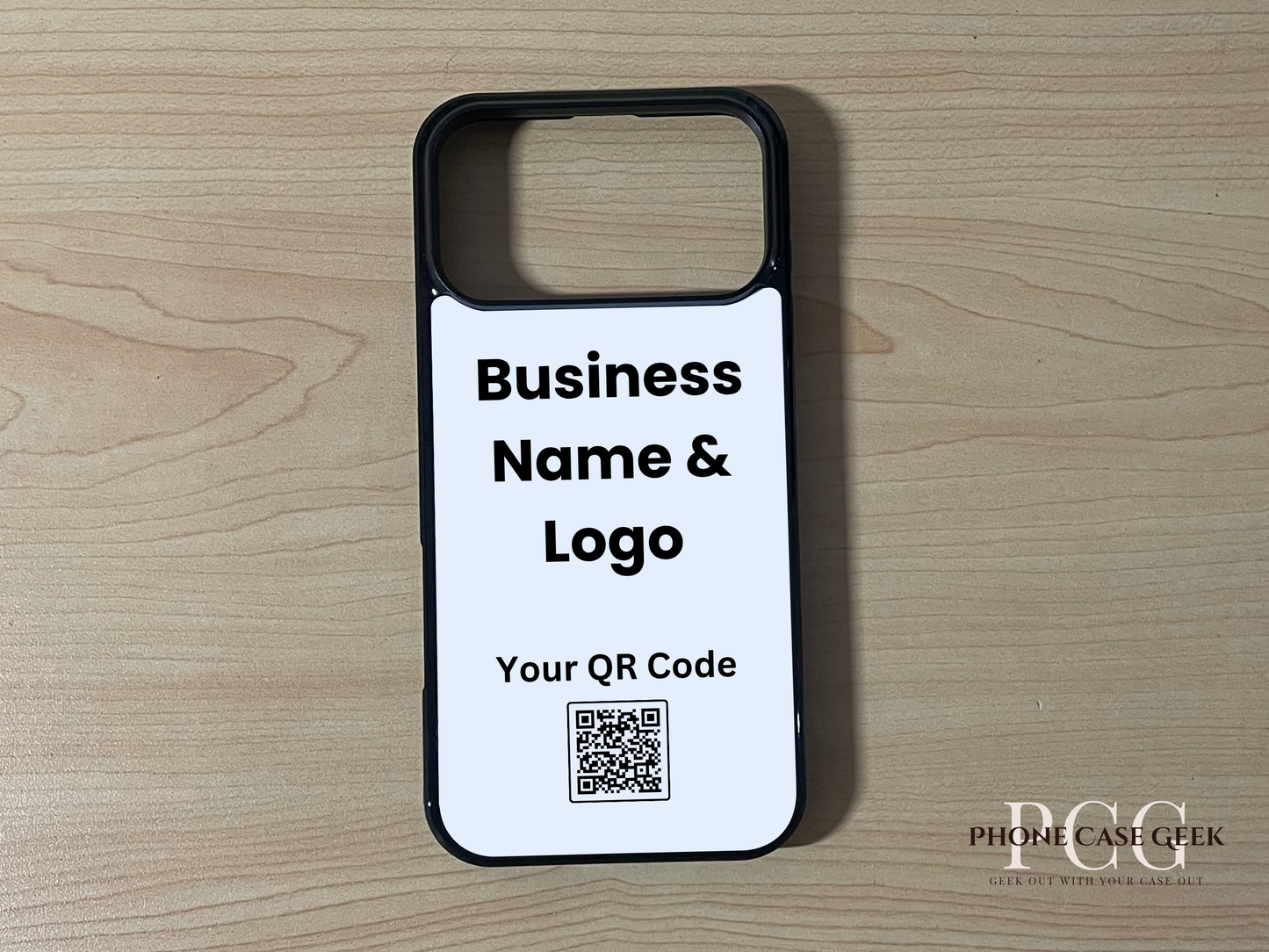 Custom phone case for the iPhone 17 Pro and 17 Pro Max showing qr code and business logo placement on a wooden surface.