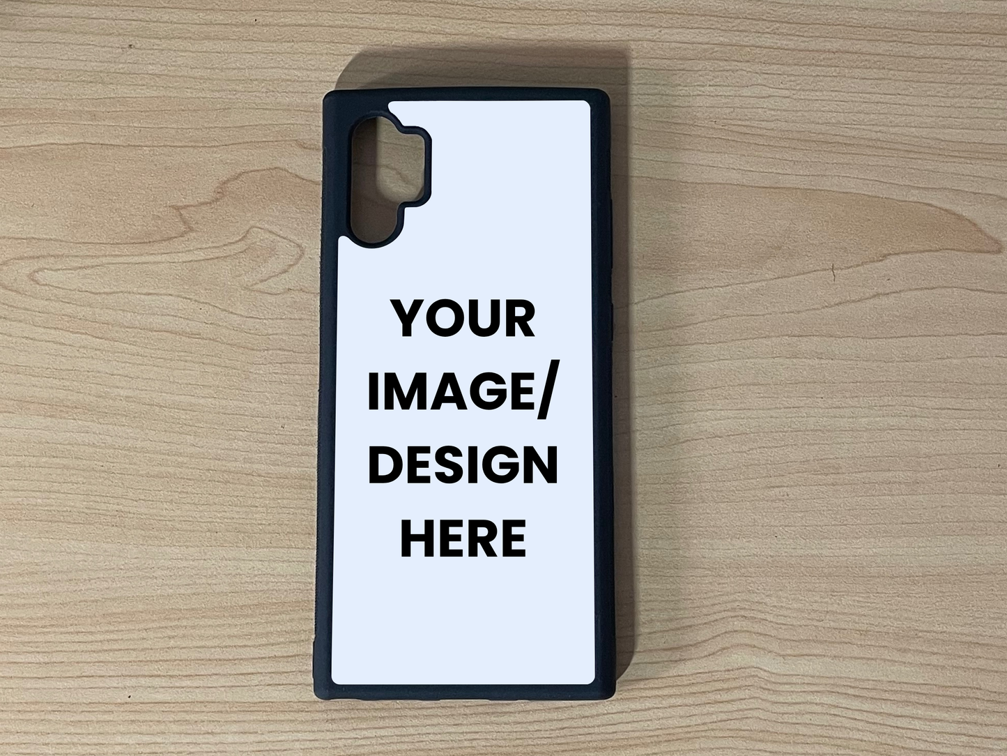 Custom phone case for Samsung Note 10 Plus with "Your Image/ design here" to show customizable area on a wooden surface