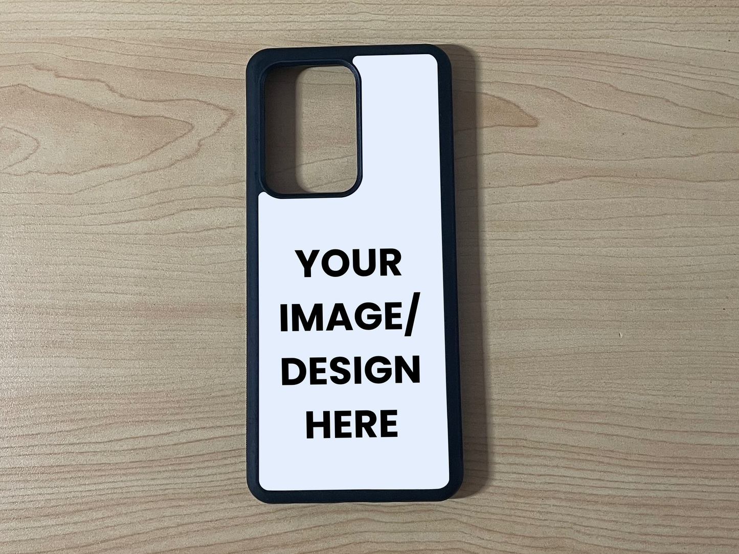 Custom phone case for the Samsung 21 Ultra, Note 20 and Note Ultra showing "Your image / design here" for placement on a wooden surface.