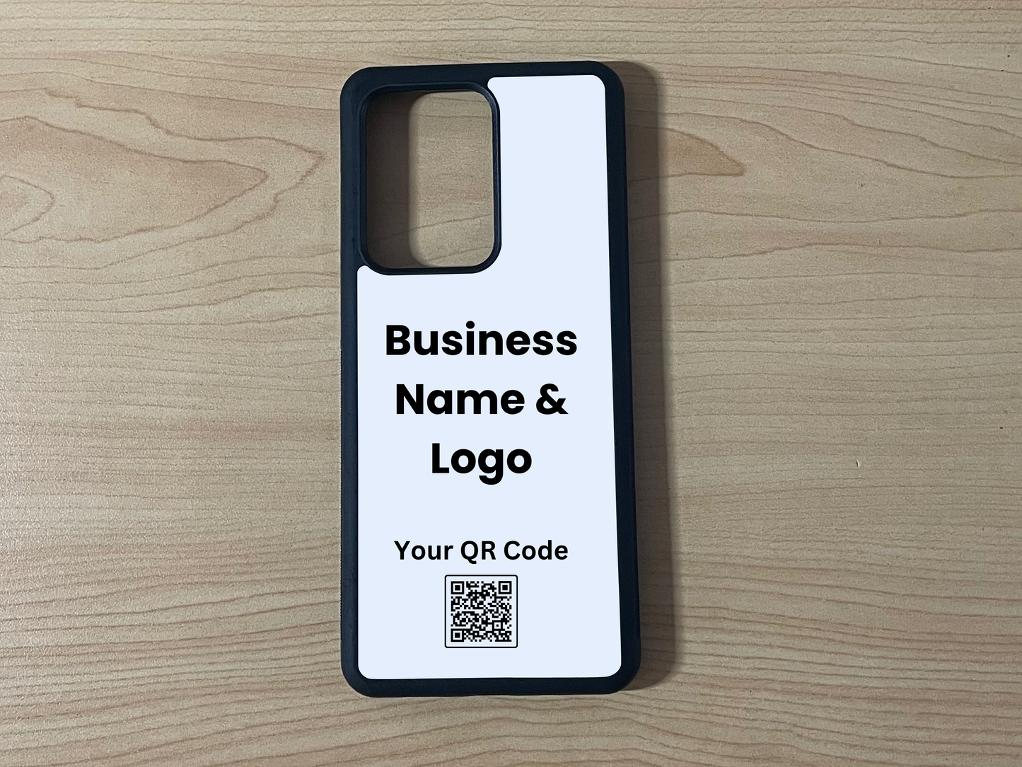 Custom phone case for the Samsung 21 Ultra, Note 20 and Note Ultra showing business branding slot and QR code placement on a wooden surface.