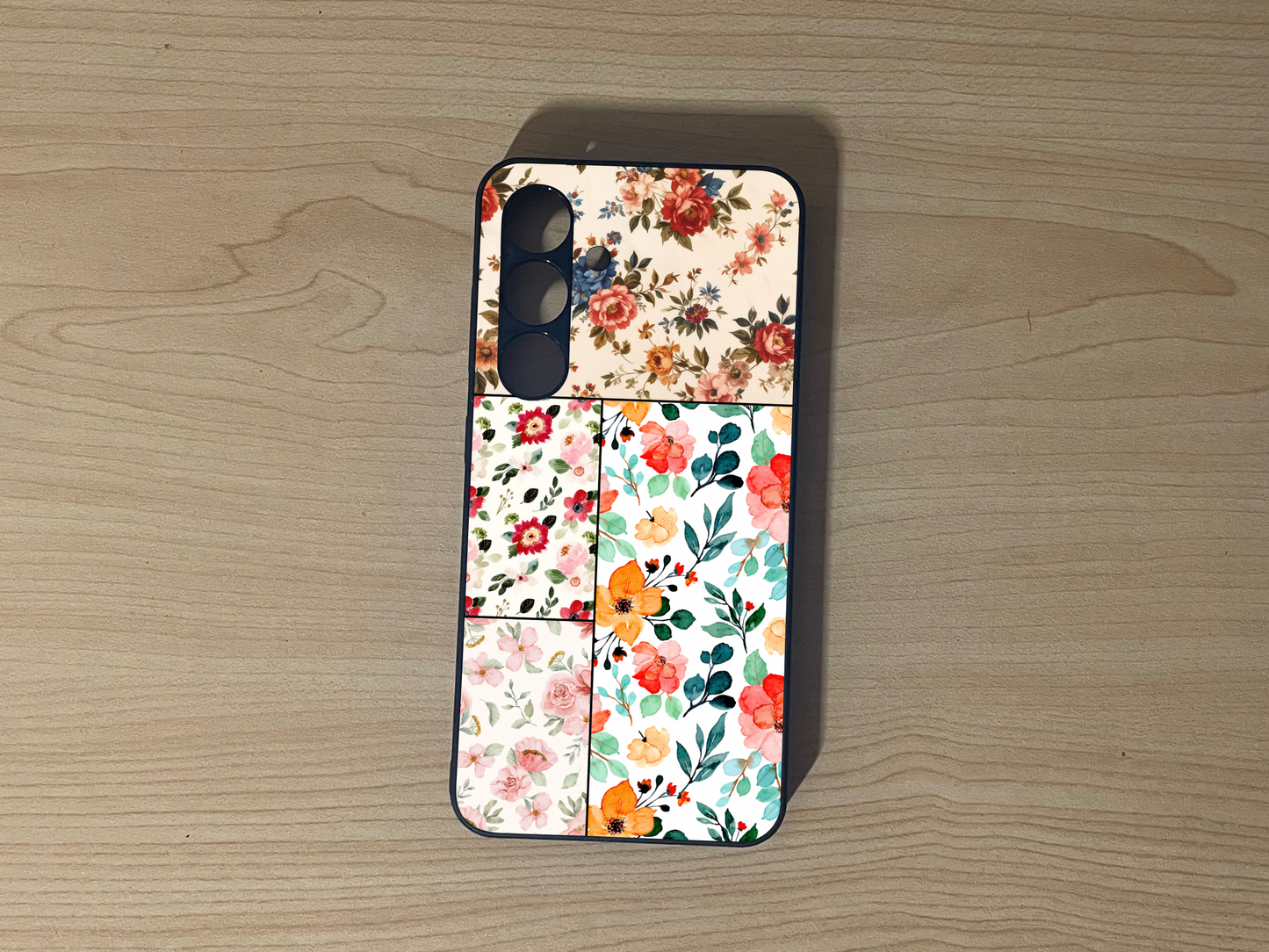 Custom phone case for the Samsung S24 and S24 Plus showing 4 photo collage with different floral print designs on a wooden surface.