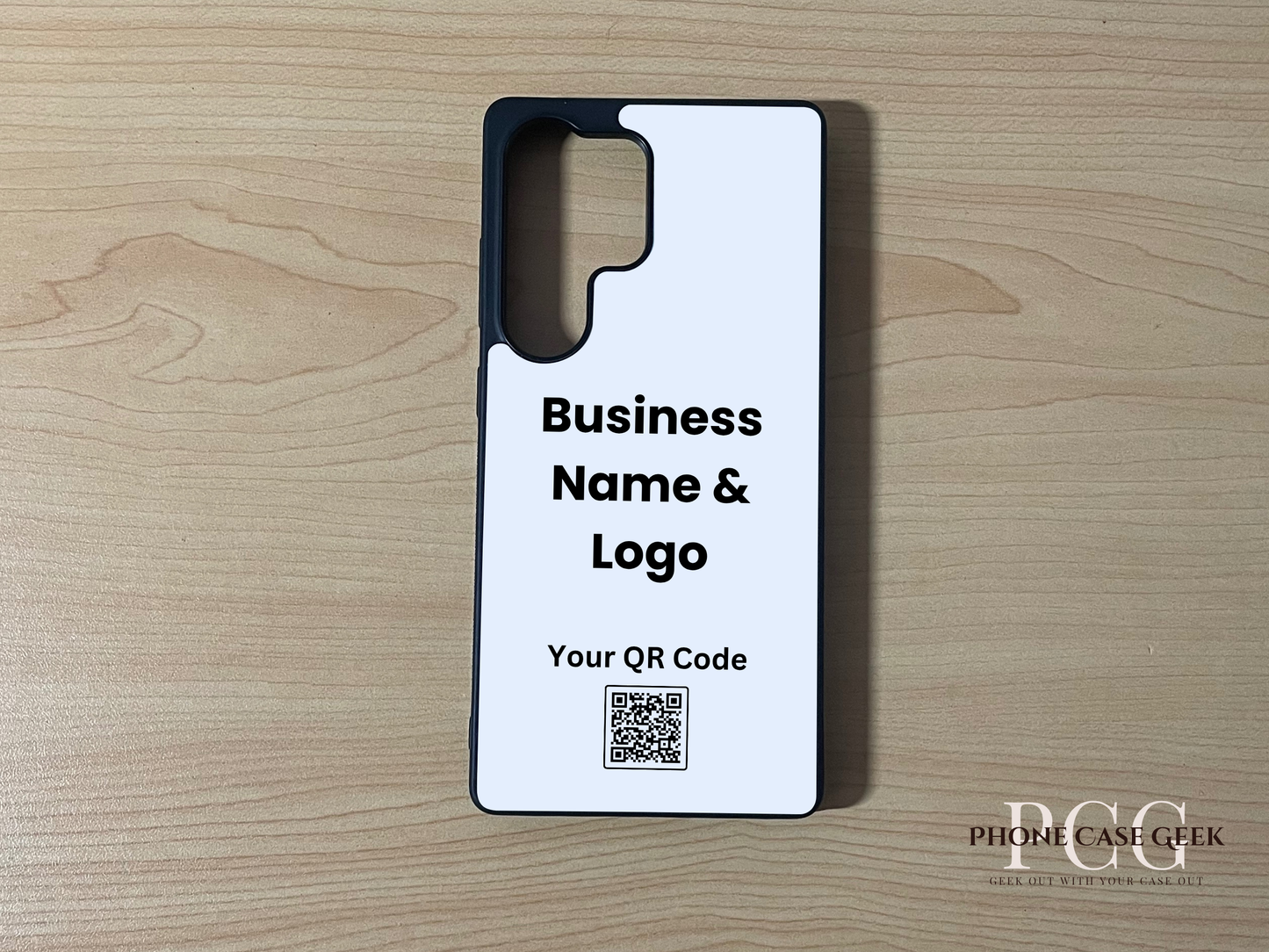 Custom phone case for the Samsung S25 Ultra showing qr code and business logo placement on a wooden surface.