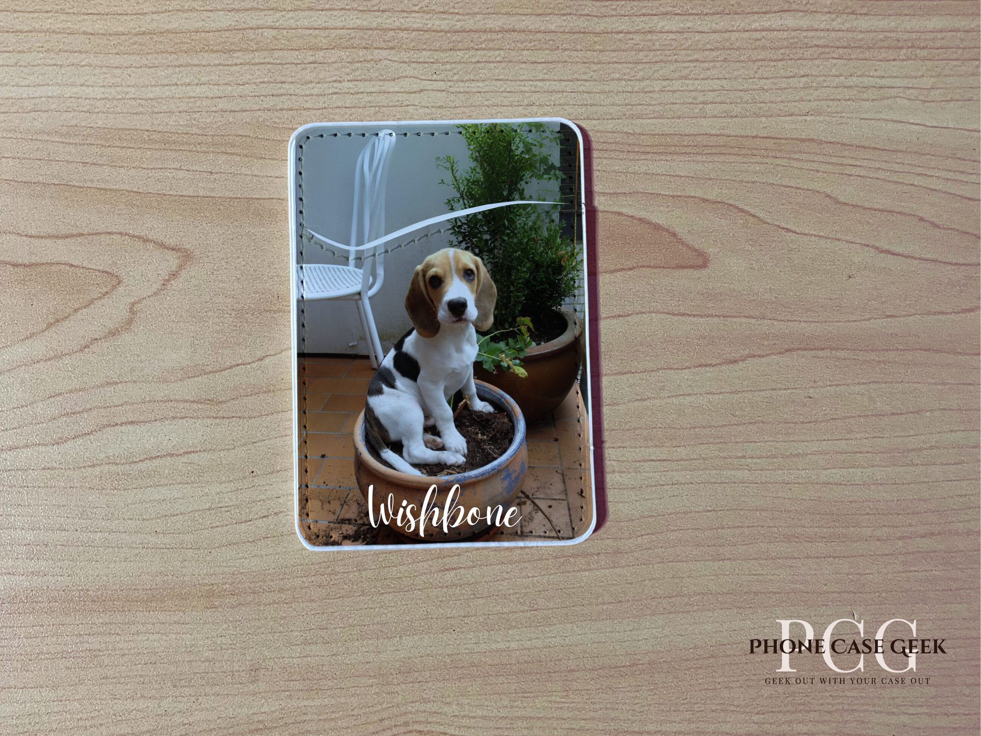 Custom adhesive phone wallet/card holder with a picture of a dog with "Wishbone" text on a wooden surface.
