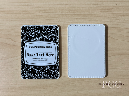 Custom Magsafe phone wallet/card holder with black and white composition notebook design on a wooden surface.