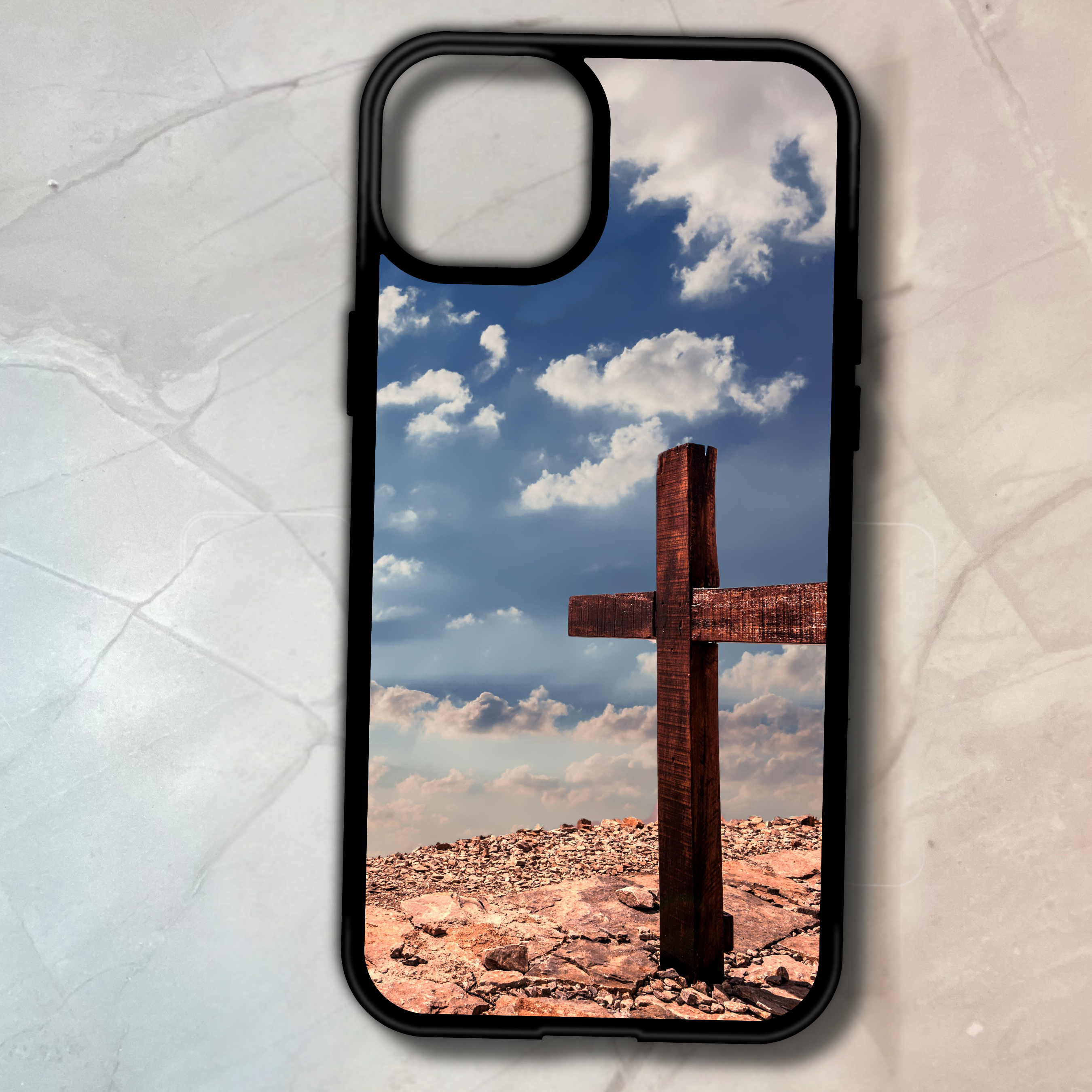 Custom phone case with a cross on a rocky landscape and blue sky