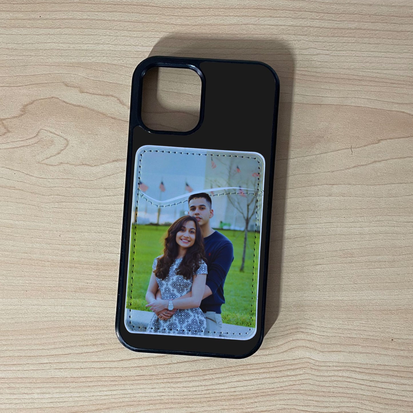 Custom plain phone case with phone wallet/card holder with couple photo on a wooden surface