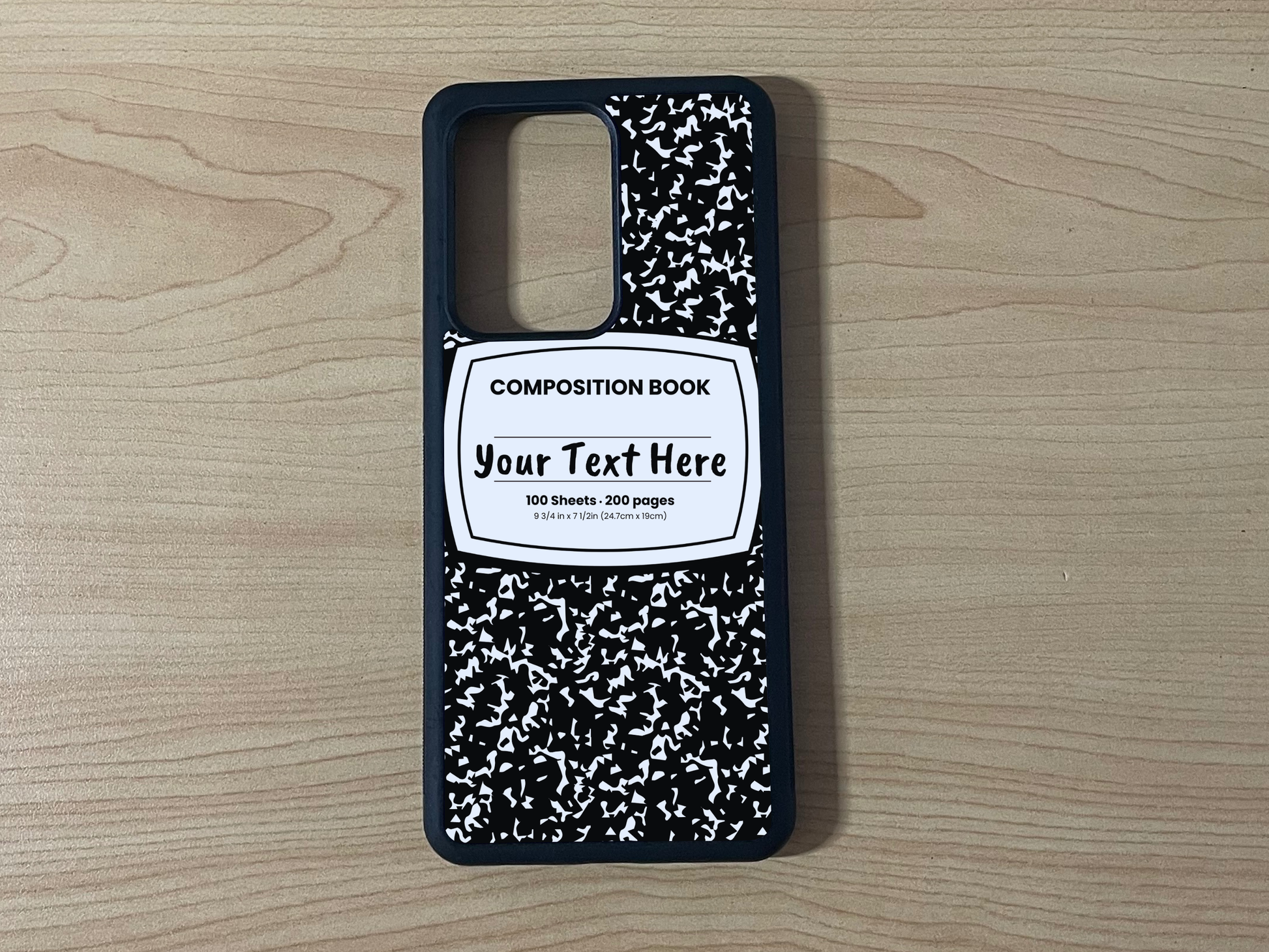 Custom phone case for the Samsung Note 20 and Note 20 Ultra with a black and white composition notebook design with text "Your text here" on a wooden surface.