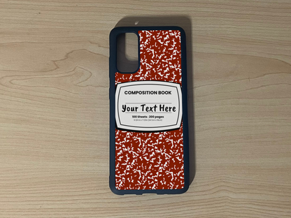 Custom phone case for the Samsung S10 and S10e with a red and white composition notebook design with text "Your text here" on a wooden surface.