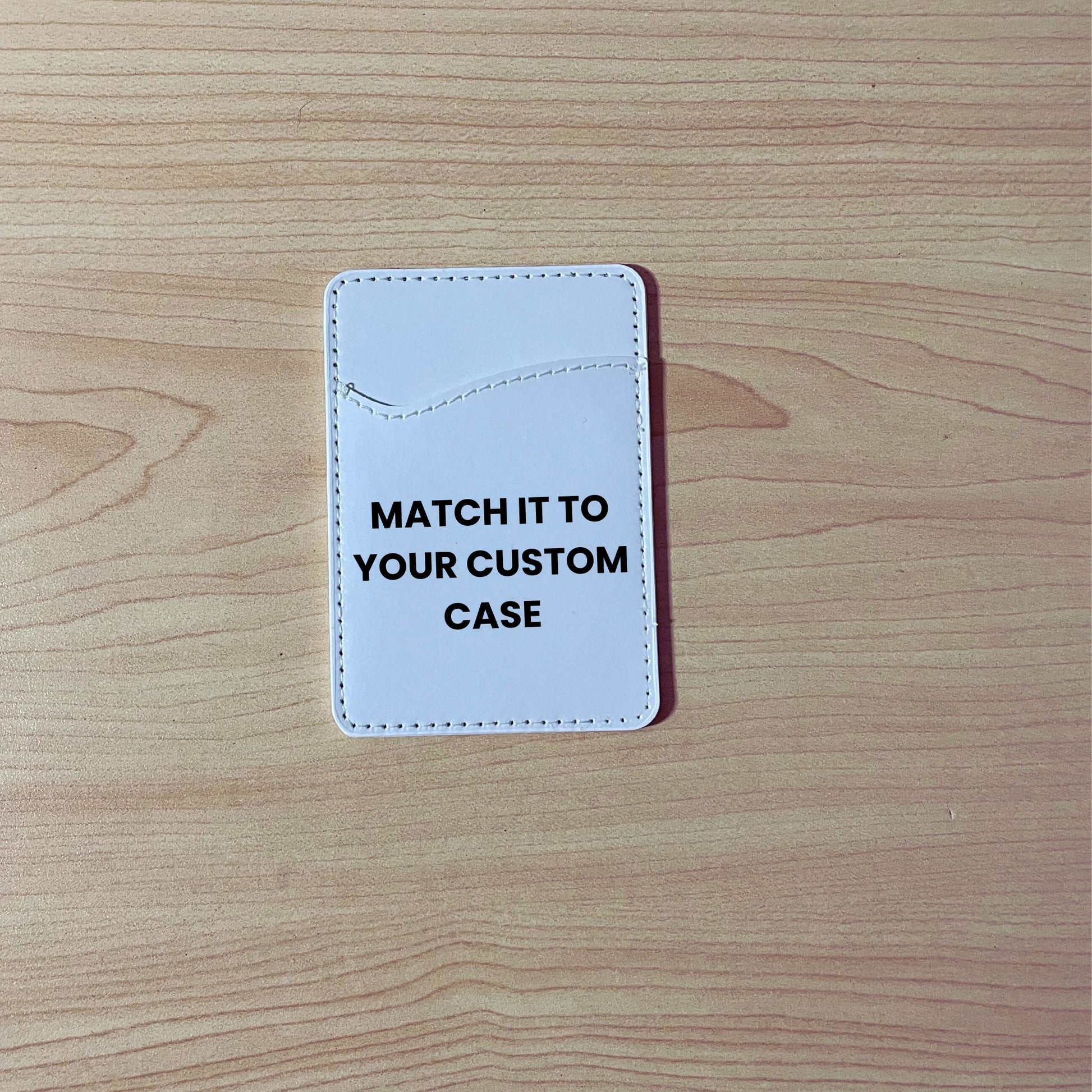 Custom adhesive phone card holder / wallet with text "Matching your phone case design" on a wooden surface.