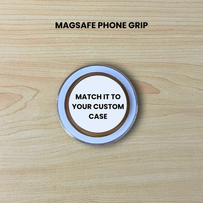 Custom clear base Magsafe phone grip with text "Match it to your custom case" on a wooden surface.