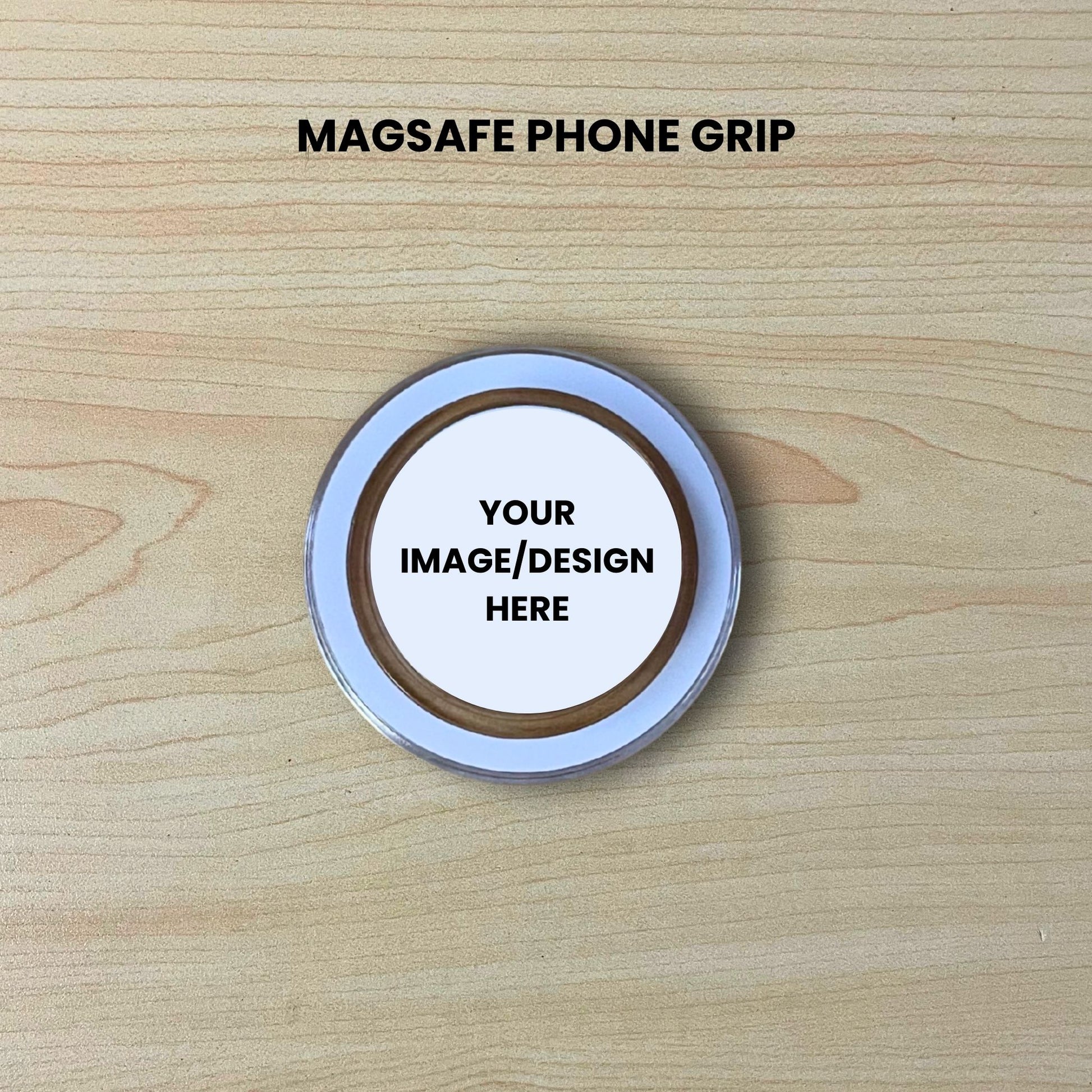 Custom clear base Magsafe phone grip mockup on a wooden surface with customizable area.