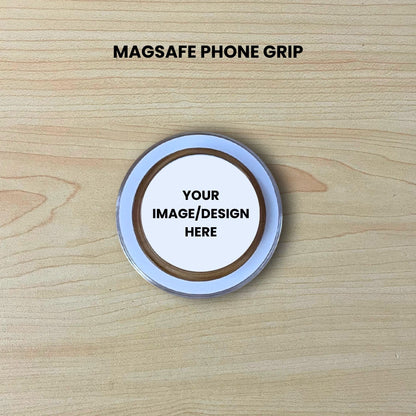 Custom clear base Magsafe phone grip mockup on a wooden surface with customizable area.