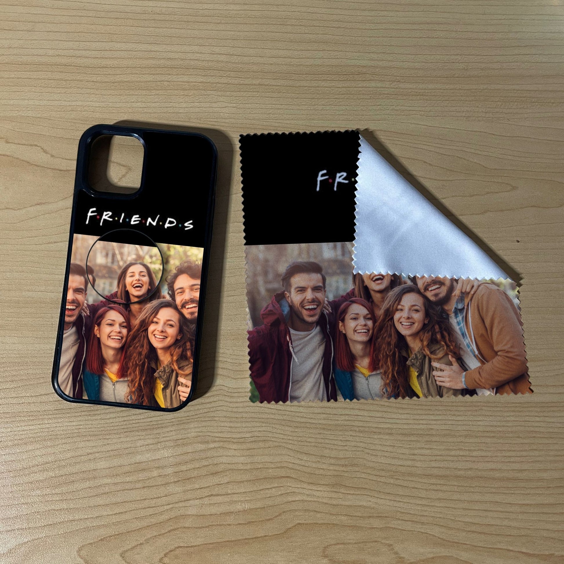 iPhone matching bundle set with a phone case, phone grip and microfiber cloth with 2 photo collage friends theme on a wooden surface