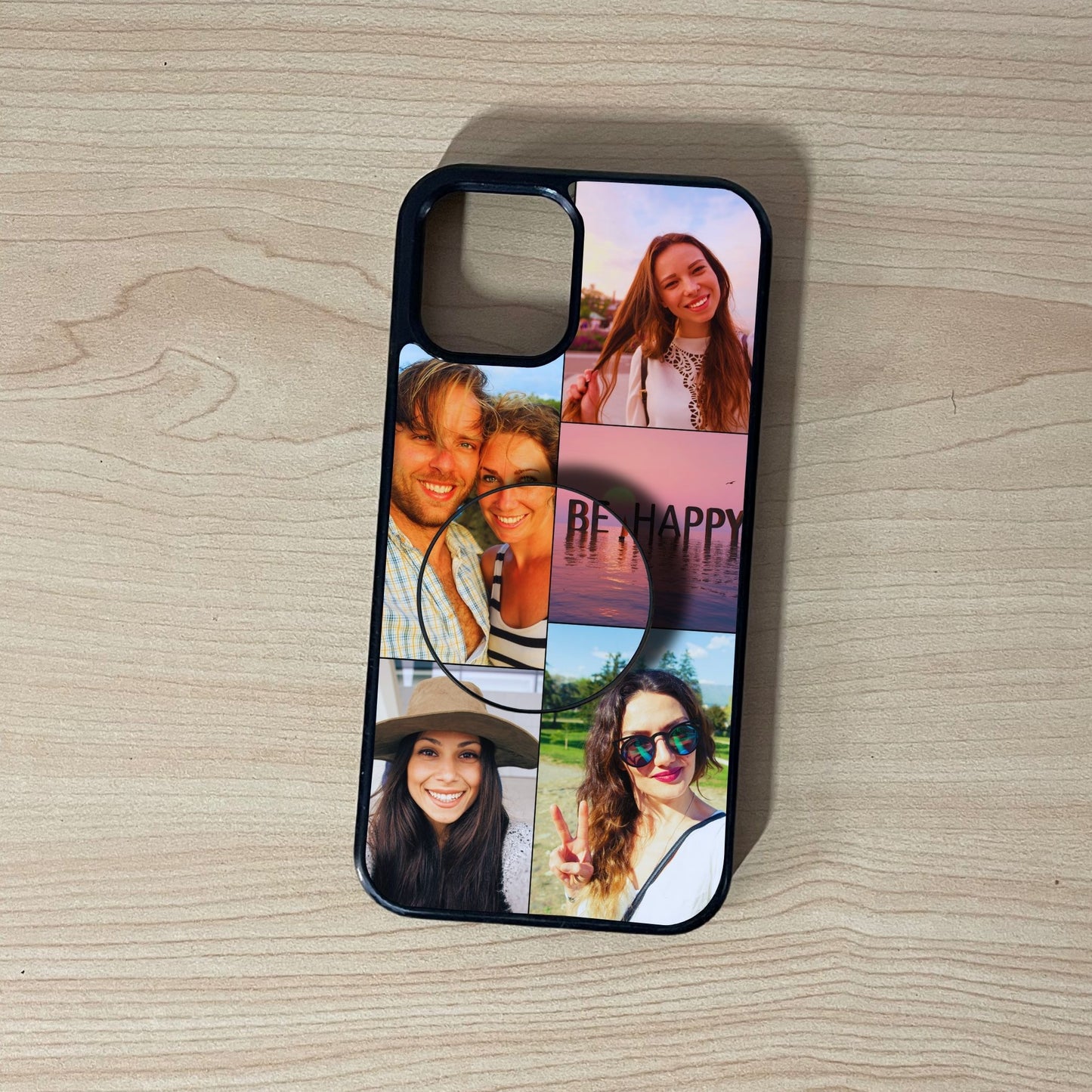 Custom iPhone case with 5 photo collage couple theme with matching phone grip attached on a wooden surface