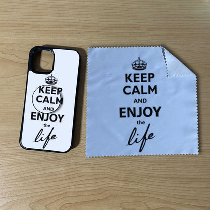 Custom iPhone case bundle set with matching phone grip and cleaning microfiber cloth with "Keep calm and enjoy the life" text design on a wooden surface