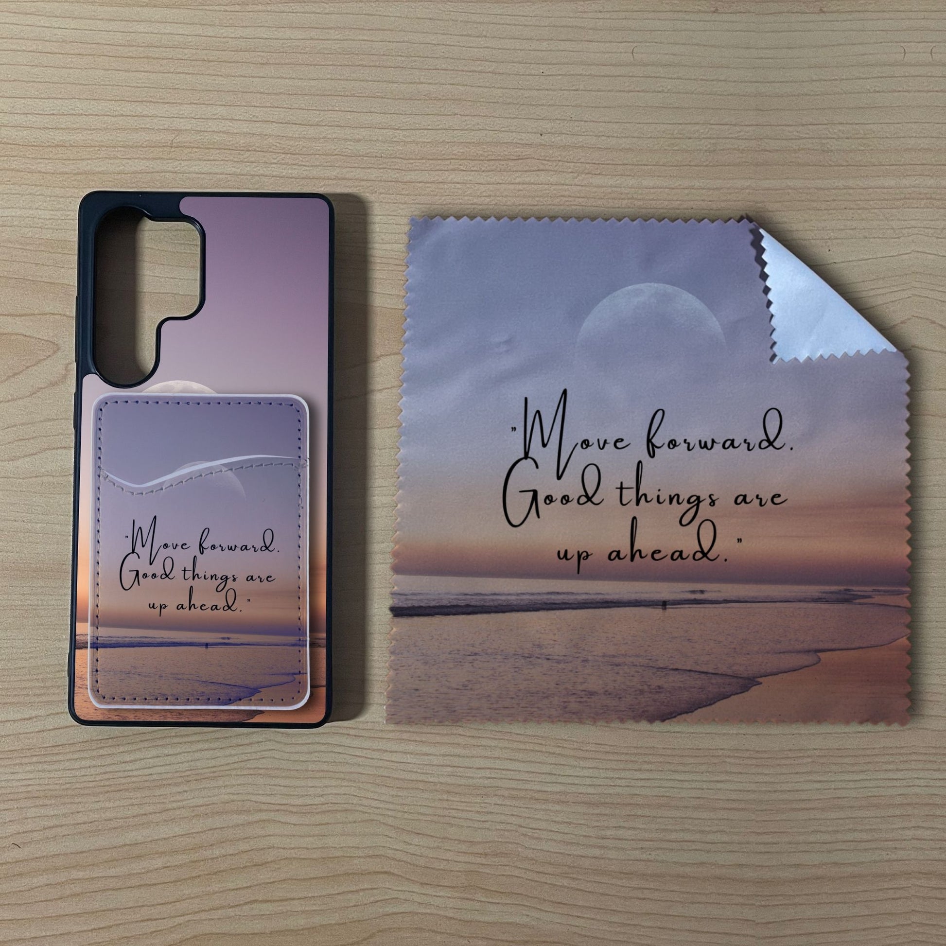 Custom Samsung case with a beach design with matching phone wallet card holder and matching microfiber cloth phone screen cleaner on a wooden surface