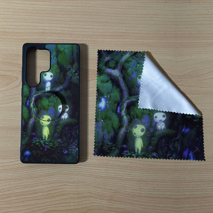 Custom Samsung case bundle set with a phone grip and cleaning cloth with matching forest design on a wooden surface.