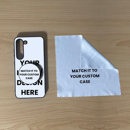 Custom Samsung S23 case with phone grip and cleaning cloth on a wooden surface with text overlay showing image placement.
