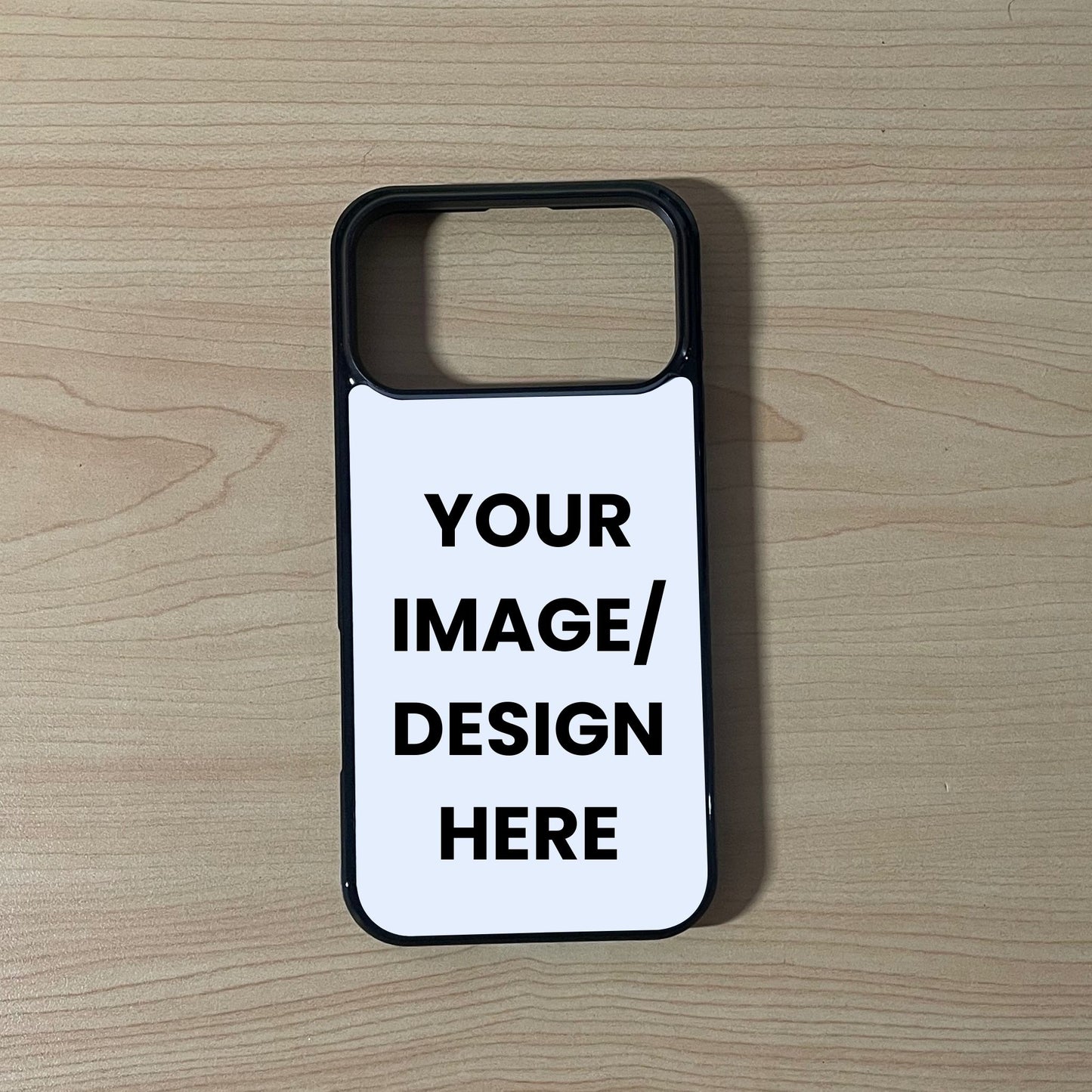 Custom phone case for the iPhone 17 Pro and 17 Pro Max showing image placement on a wooden surface.