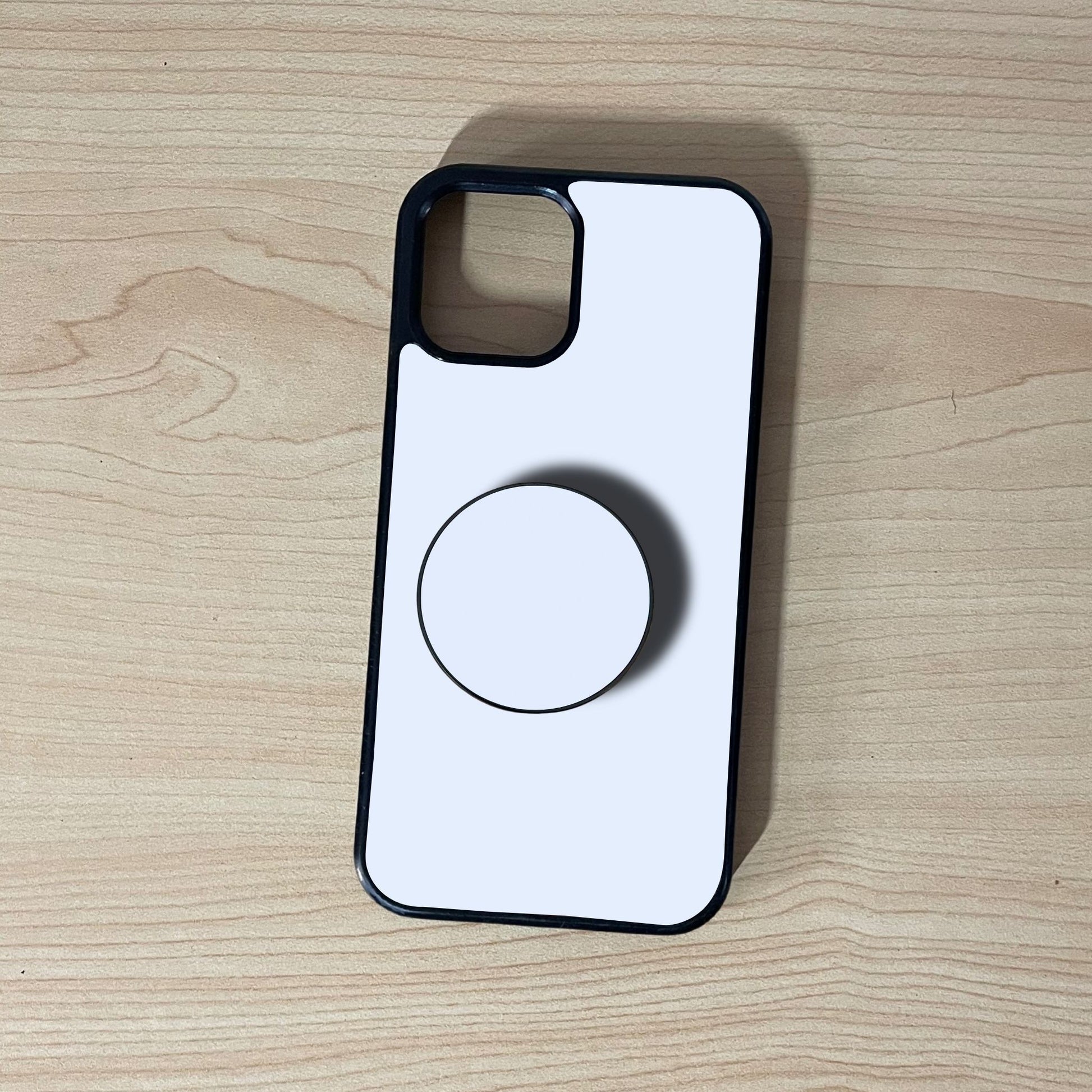 iPhone custom case with a phone grip attached on a wooden surface.