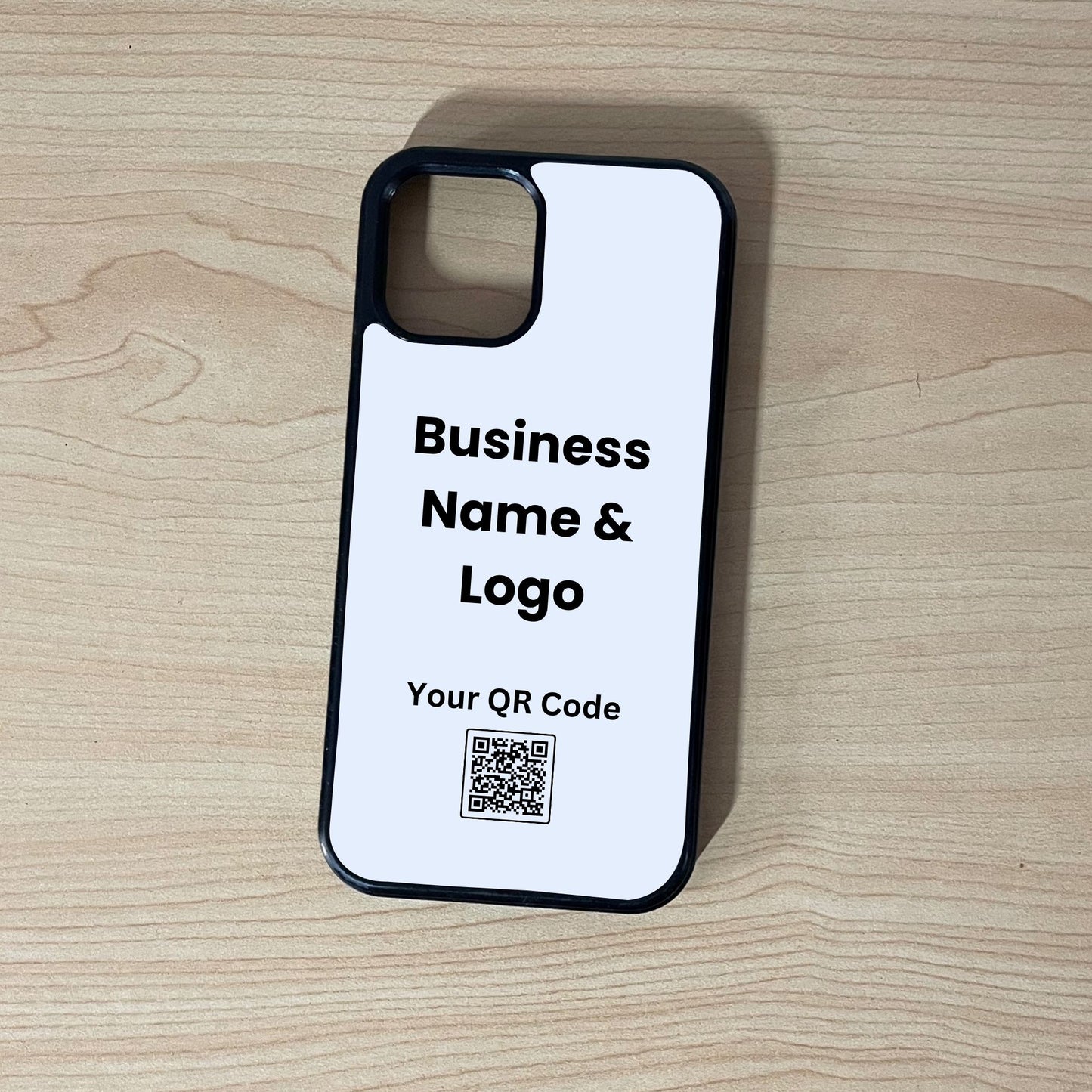 Custom business branding iPhone case with customizable text and QR code on a wooden surface