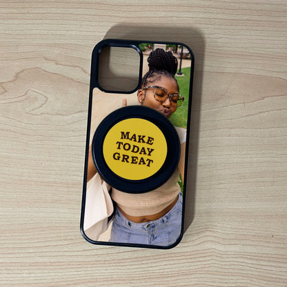 Custom Magsafe iPhone case with selfie of a woman photo and black base Magsafe custom phone grip on a wooden surface.