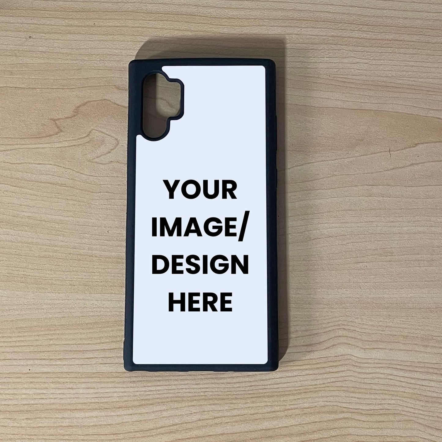 Custom phone case for Samsung Note 10 Plus with "Your Image/ design here" to show customizable area on a wooden surface