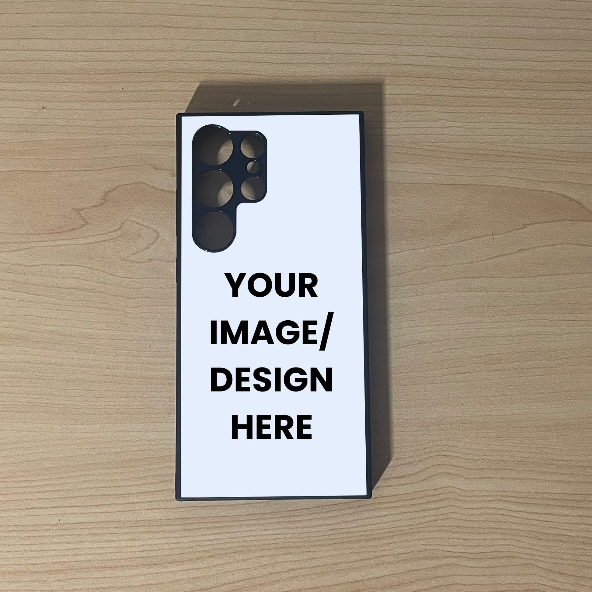 Custom phone case for the Samsung S24 Ultra, S23 Ultra, and S22 Ultra showing "Your Image / design here" to show customization placement on a wooden surface.