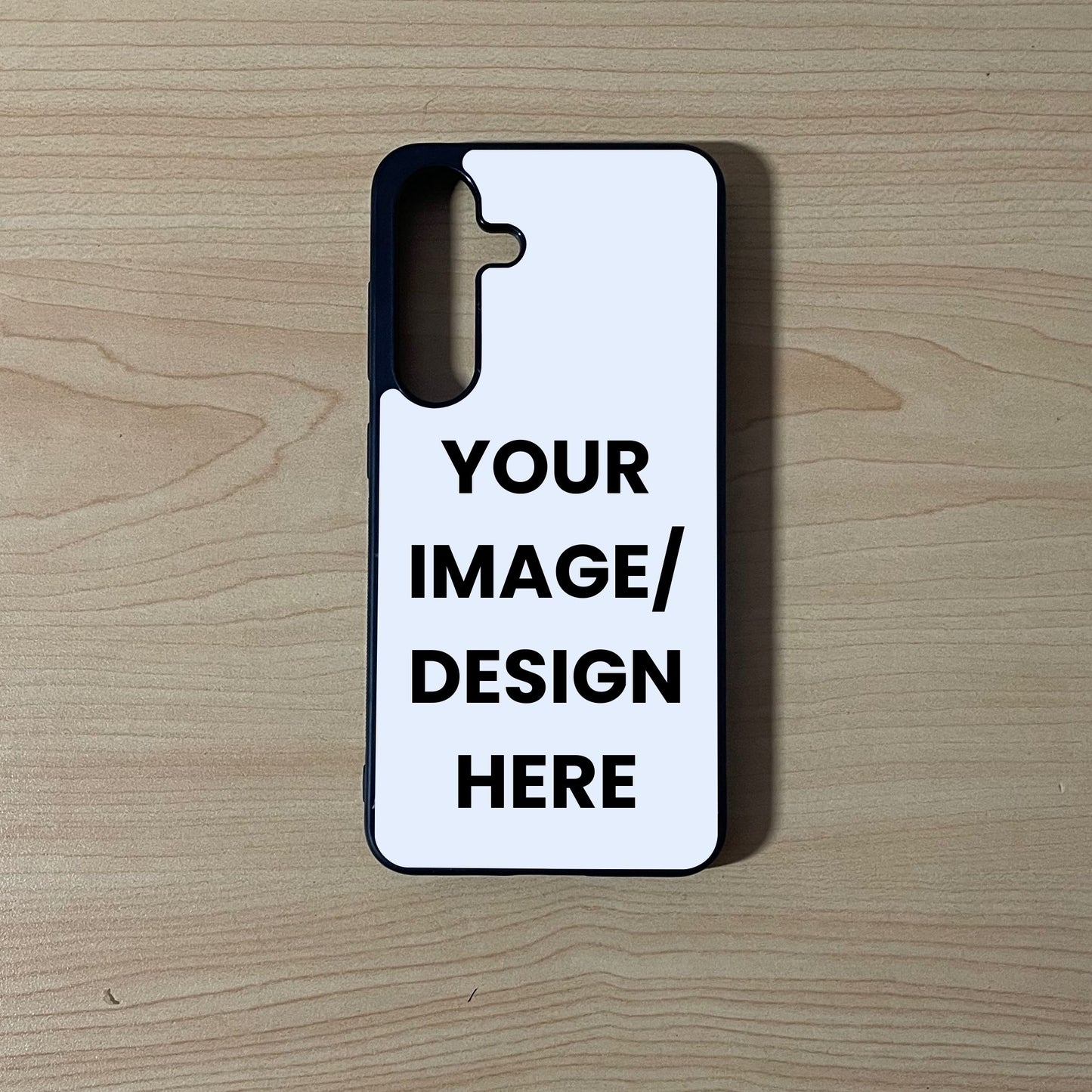 Custom phone case for the Samsung S25 and S25 Plus showing image placement on a wooden surface.